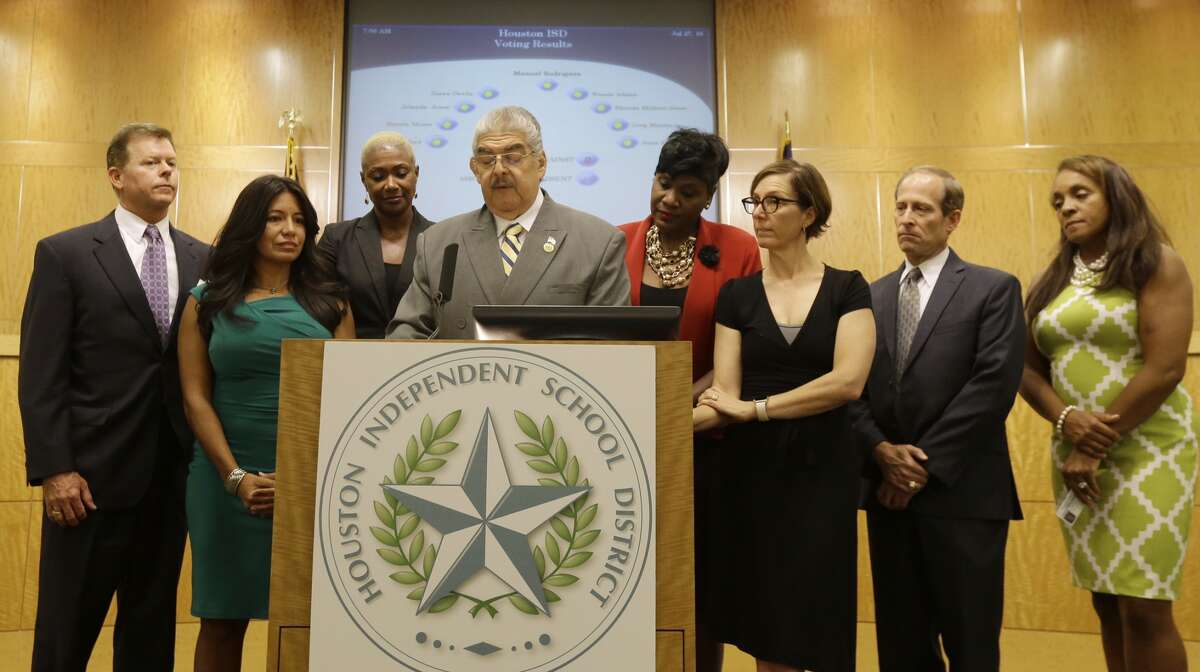 Houston school board president Manuel Rodriguez Jr., surrounded by the other trustees, addressed the media after naming Richard Carranza as the sole finalist for the superintendent's job in July 2016.