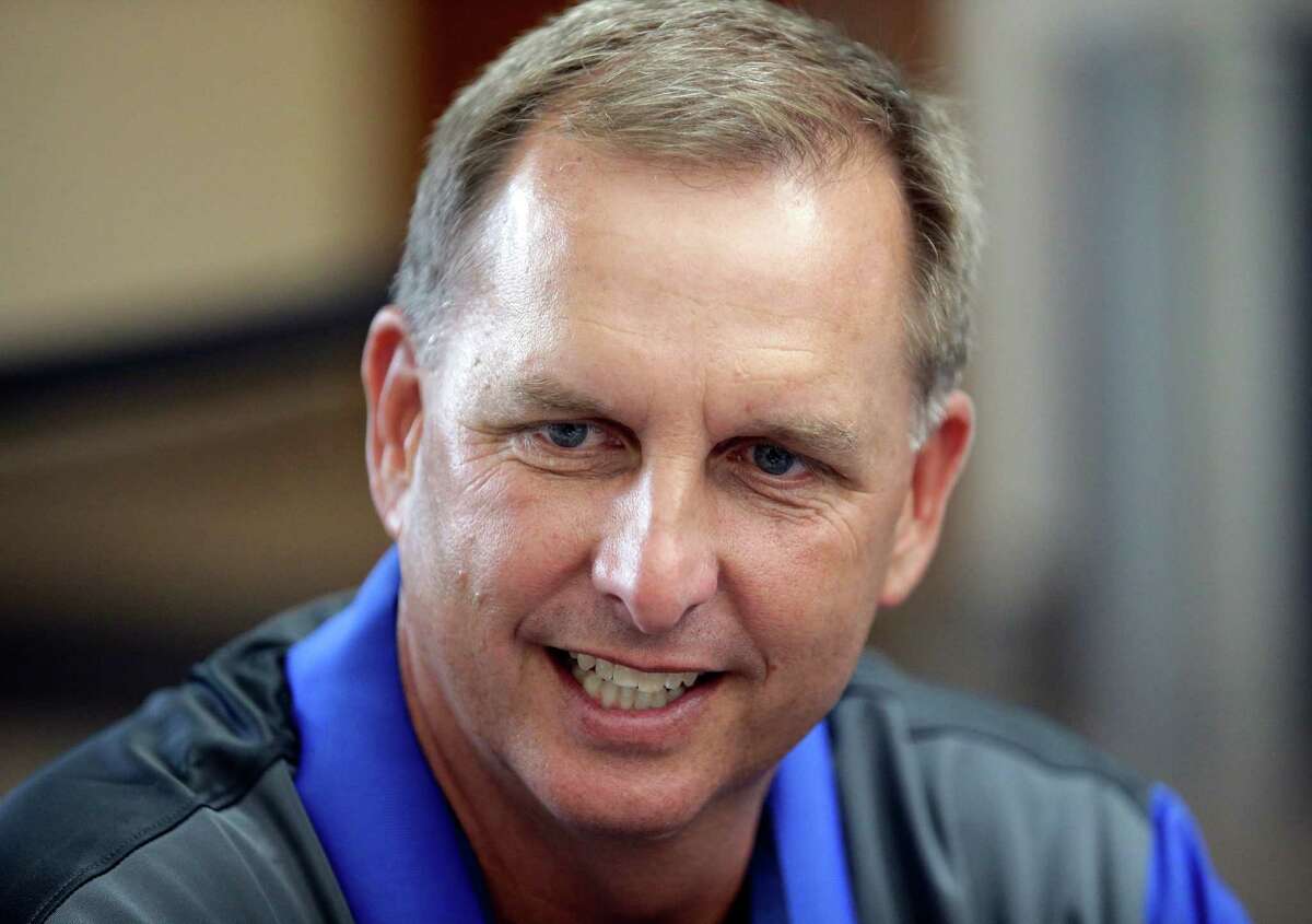 BYU offensive coordinator and quarterbacks coach Ty Detmer speaks with reporters during NCAA college football media day Thursday, June 30, 2016, in Provo, Utah. (AP Photo/Rick Bowmer)