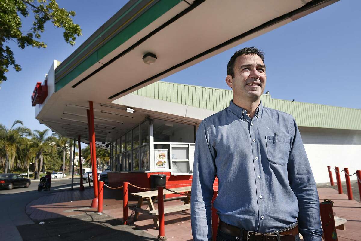 Architect Ken Lowney in front of the Kwik Way Diner, which is currently housing the Merritt Bakery, in Oakland. The building's owner, Alex Hahn, is pushing plans to turn it into a mixed-use project with three stories of housing, two stories of parking and 3,000 square feet of retail.
