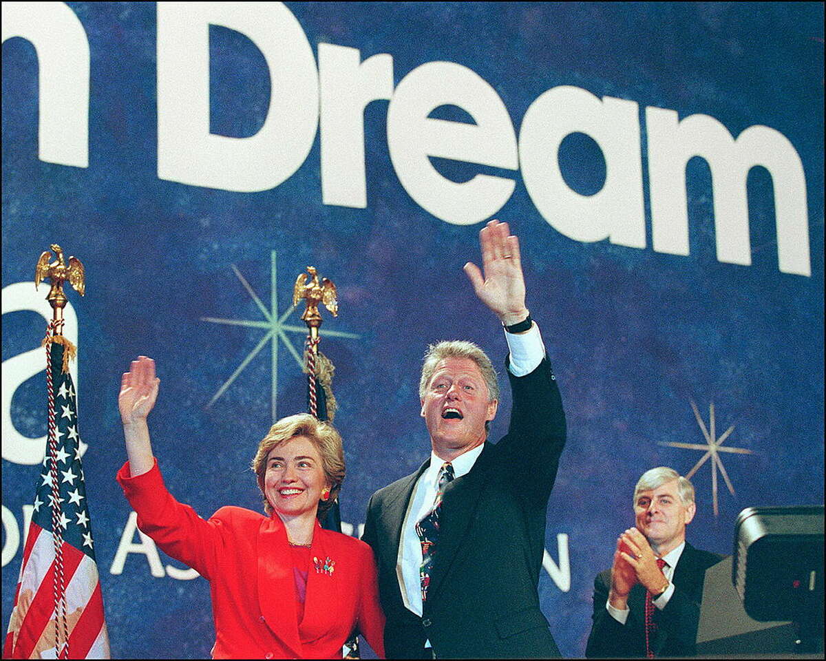 1993: US President Bill Clinton, center, in a picture dated 05 July 1993 in San Francisco and his wife, Hillary, wave to Arkansas delegation at NEA Convention.