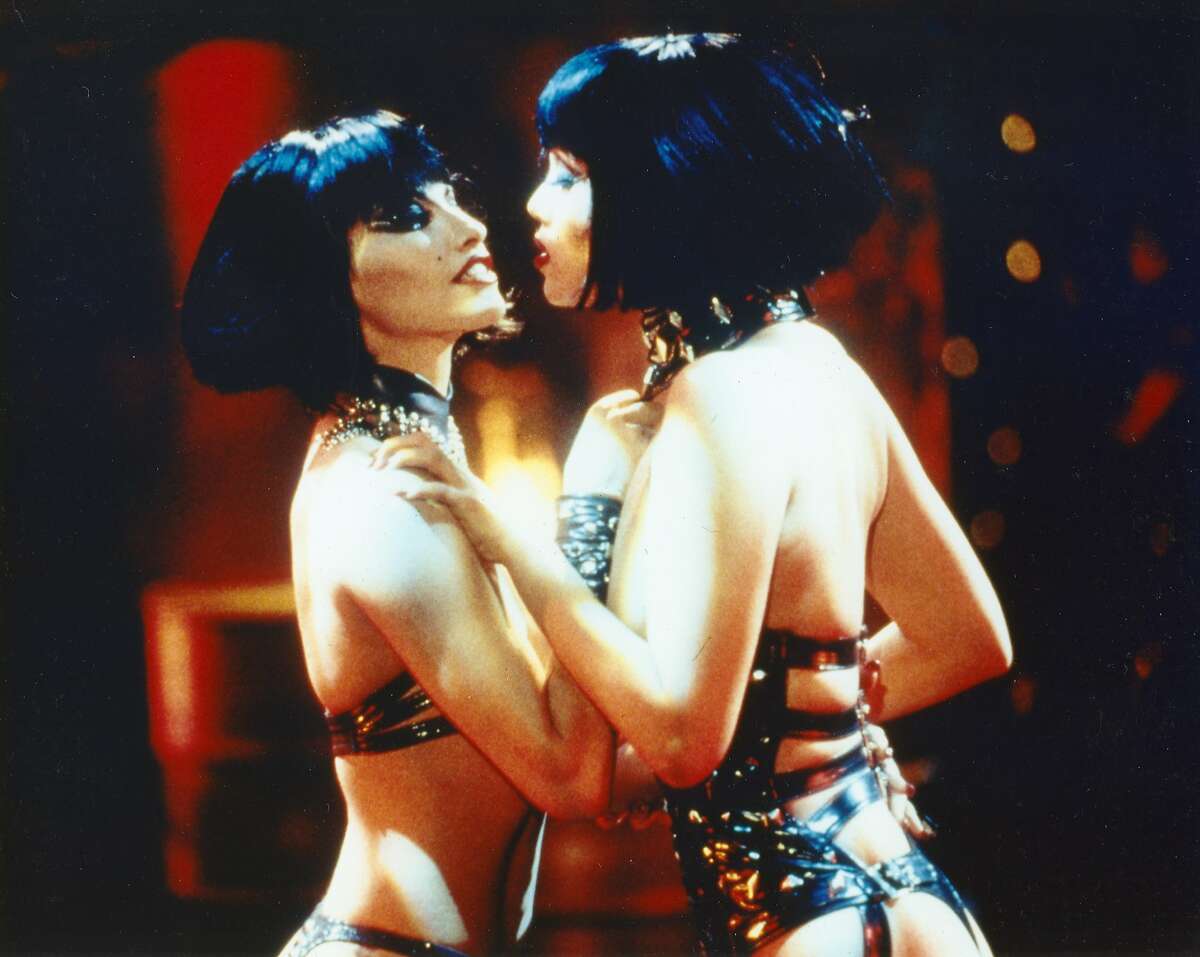 Showgirls is a 1995 American drama film directed by Paul Verhoeven and starring former teen actress Elizabeth Berkley, Kyle MacLachlan, and Gina Gershon. QFest photo.