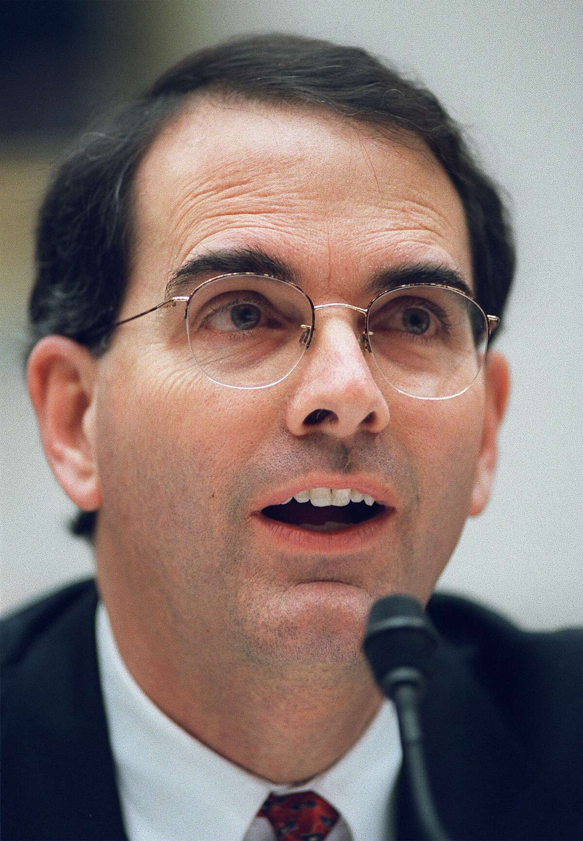 In this Feb. 14, 2002 file photo, Jay Bybee testifies before a congressional committee in Washington. Former Justice Department lawyers Jay Bybee and John Yoo showed "poor judgment" but did not commit professional misconduct when they authorized CIA interrogators to use waterboarding and other harsh tactics at the height of the U.S. war on terrorism, an internal review released Friday, Feb. 19, 2010 found. (AP Photo/Evan Vucci, File)