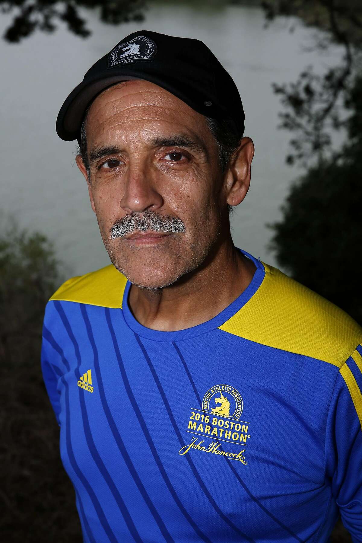 Leo Rosales poses for a photograph before a race near Lake Merced in San Francisco, California, on Thursday, July 28, 2016.