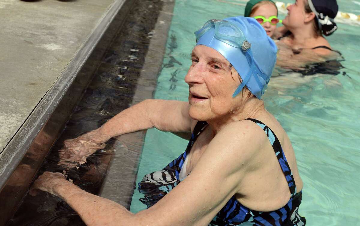 Margaret Wachs celebrates her 100th birthday with a 1/4 mile swim as a fundraiser for the Stratford United Methodist Church Friday, Sept. 20, 2013 at the Woodruff Family YMCA in Milford, Conn. Her funeral will take place on Saturday, July 30, 2016.