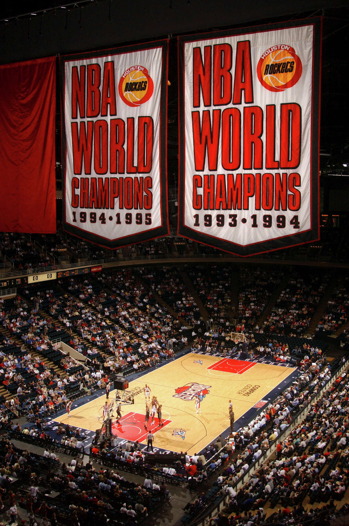 April 16, 2003 - Banners from the glory years of the Houston Rockets - back-to-back NBA championships - fly for the last time from the rafters of Compaq Center. The facility once known as The Summit served as the Rockets' home for 28 years. Compaq Center became Lakewood Church and the Rockets, moved to a downtown facility the next season. The Rockets prevailed in their final home game at the site with a 97-86 win over the Memphis Grizzlies. Â Houston Chronicle