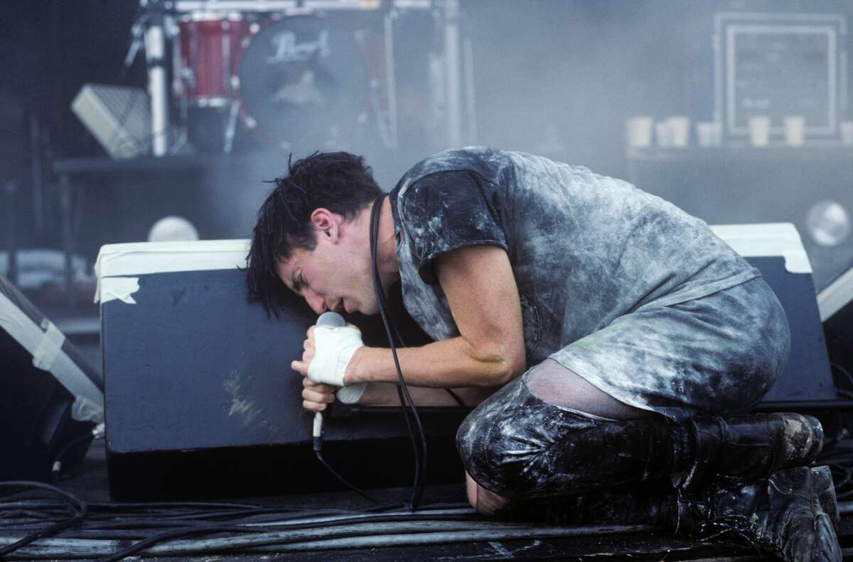 Trent Reznor performing with Nine Inch Nails at Lollapalooza in Waterloo, New Jersey on August 14, 1991. (Photo by Ebet Roberts/Redferns)