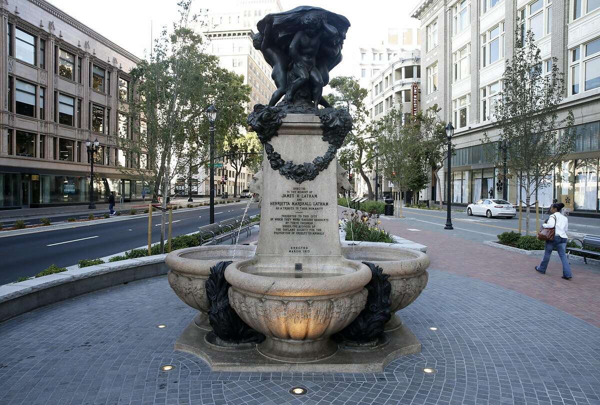 Water flows once again from the fountain at Latham Square in Oakland, Calif. on Friday, July 29, 2016. A three-year renovation project was just completed on the 103-year-old plaza, located in the heart of downtown Oakland.