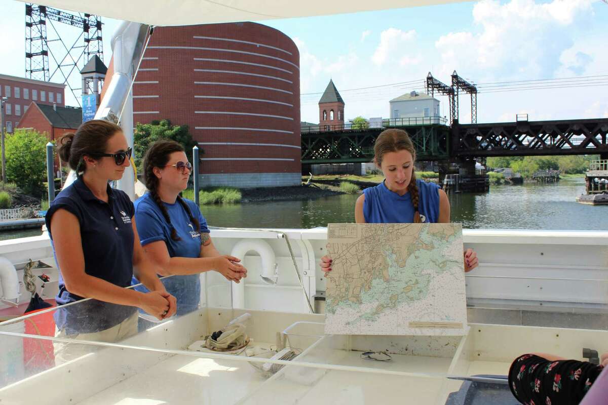 Devon Forest, educator at The Maritime Aquarium at Norwalk, discusses the landscape of the Long Island Sound on a Scenic Coastal Cruise hosted by the aquarium July 28 in Norwalk.