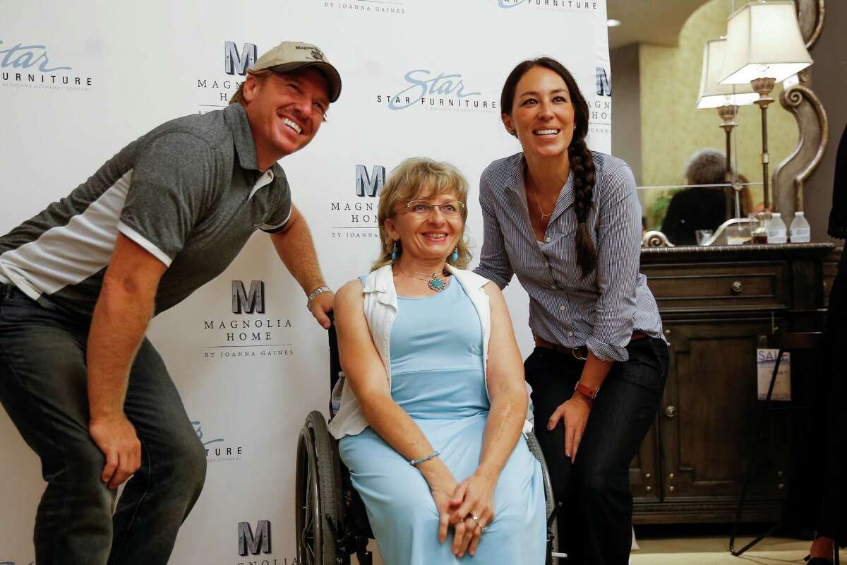 Chip and Joanna Gaines , from the HGTV show "Fixer Upper", meet fans at Star Furniture in Houston in July 2016.