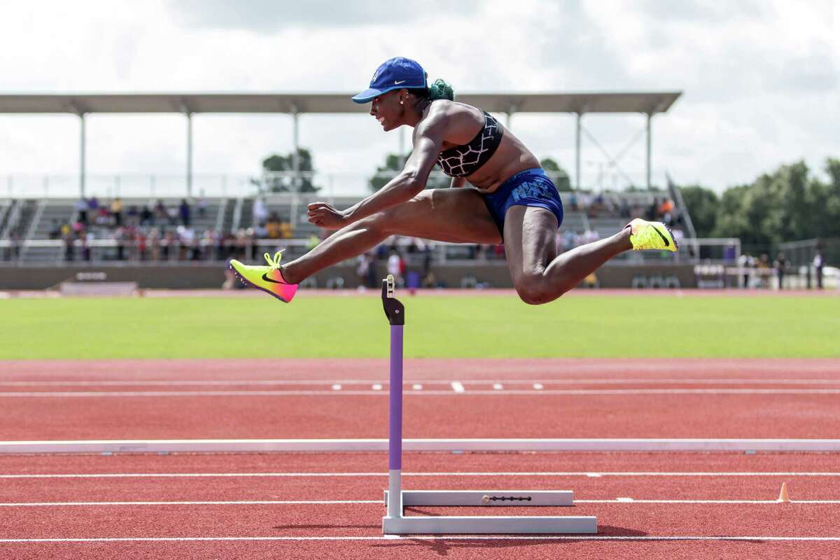 U.S. hurdler Nia Ali works on her form during Olympic team workouts Friday at Blackshear Field in Prairie View.