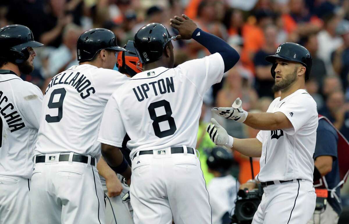 July 29: Tigers 14, Astros 6 Detroit Tigers' Tyler Collins, right, is greeted at home plate by Jarrod Saltalamacchia, left, Nick Castellanos (9) and Justin Upton (8), after his three-run home run during the second inning of a baseball game against the Houston Astros, Friday, July 29, 2016, in Detroit. (AP Photo/Carlos Osorio)