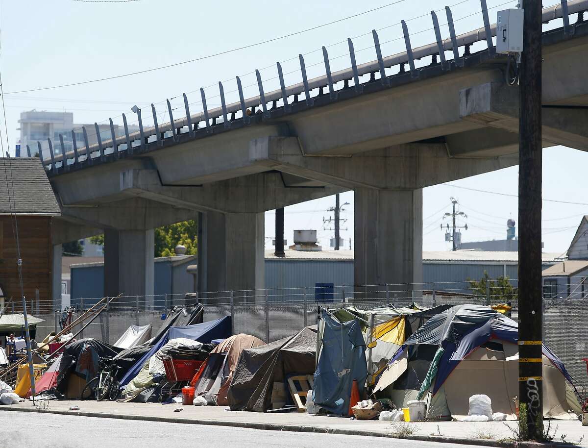 Homeless camps are popping up all over Oakland, Calif., including one at 5th and Brush streets on Saturday, July 30, 2016.