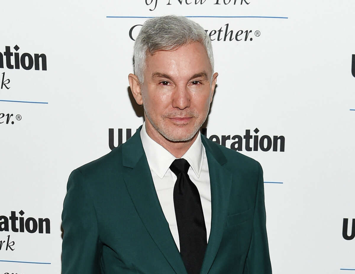 FILE - In this June 16, 2016 file photo, director Baz Luhrmann attends the UJA-Federation of New York's "Music Visionary of the Year Award" luncheon in New York. Luhrmann is producing and directing his first Netflix series, "The Get Down," which covers the early years of hip hop as told through the eyes of several young people from the South Bronx in the mid 1970Â?’s. The 13-episode series premieres Aug. 12. (Photo by Evan Agostini/Invision/AP, File)