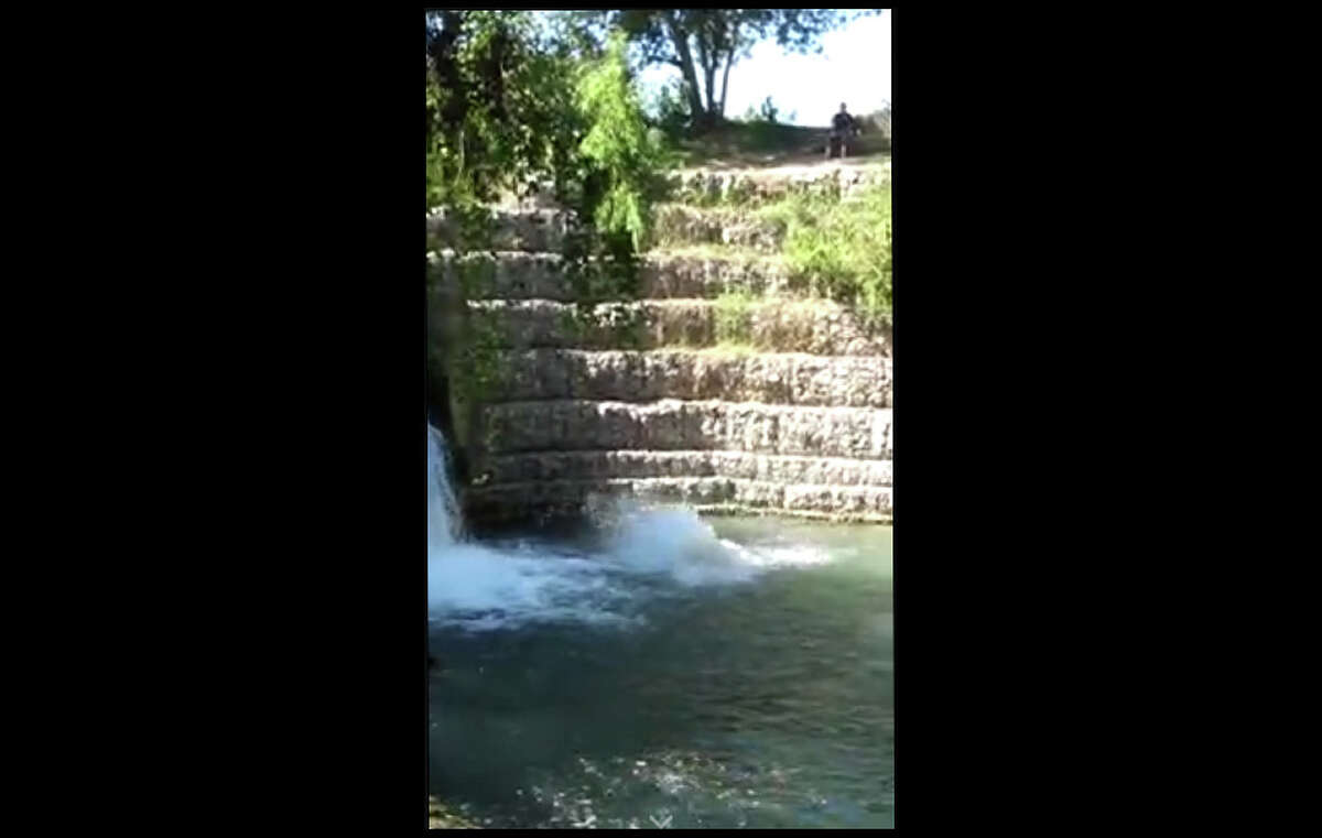 A popular cliff for jumping at Stokes Park in San Marcos.