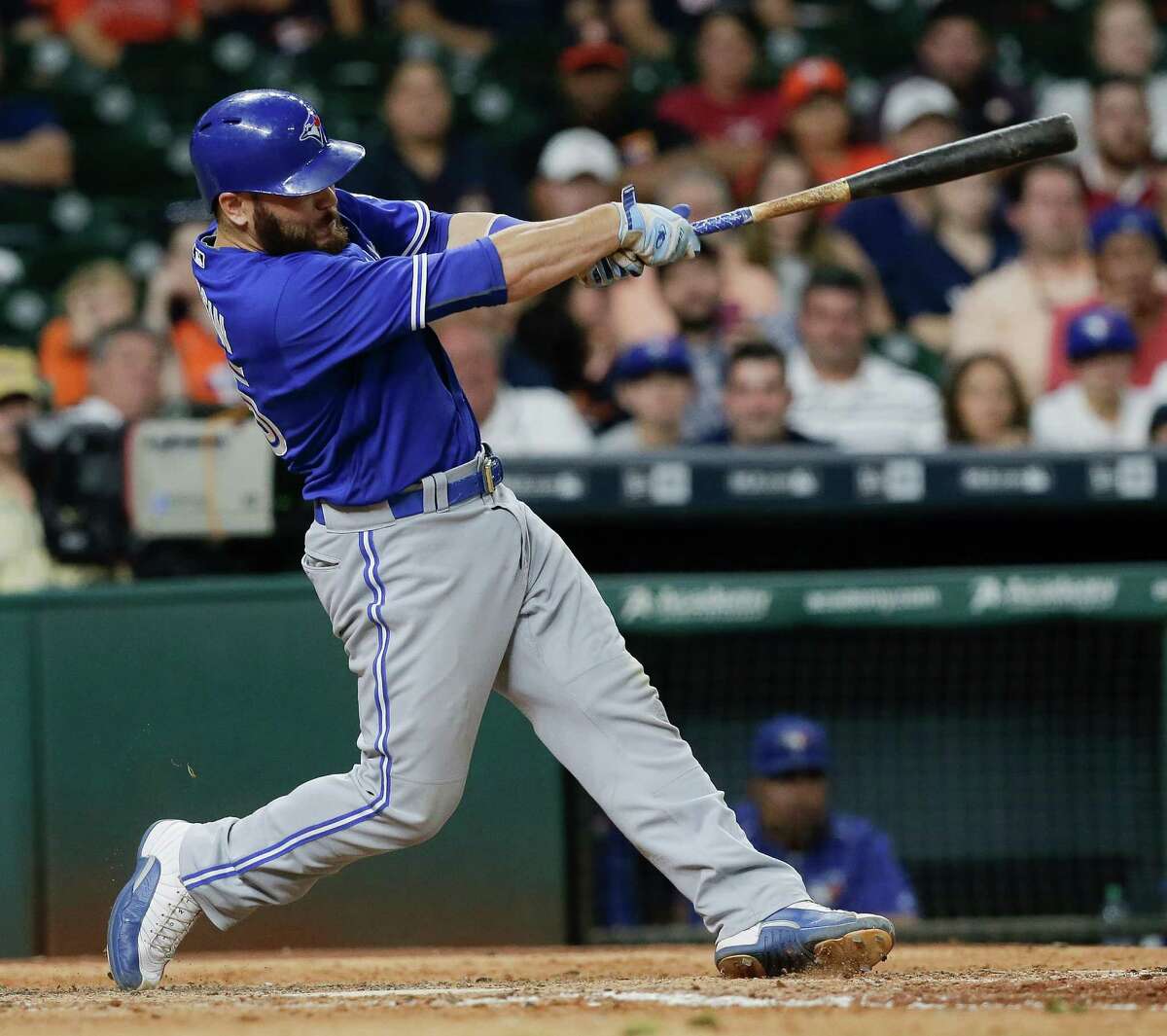 HOUSTON, TX - AUGUST 01: Russell Martin #55 of the Toronto Blue Jays hits a home run in the ninth inning against the Houston Astros at Minute Maid Park on August 1, 2016 in Houston, Texas. (Photo by Bob Levey/Getty Images)