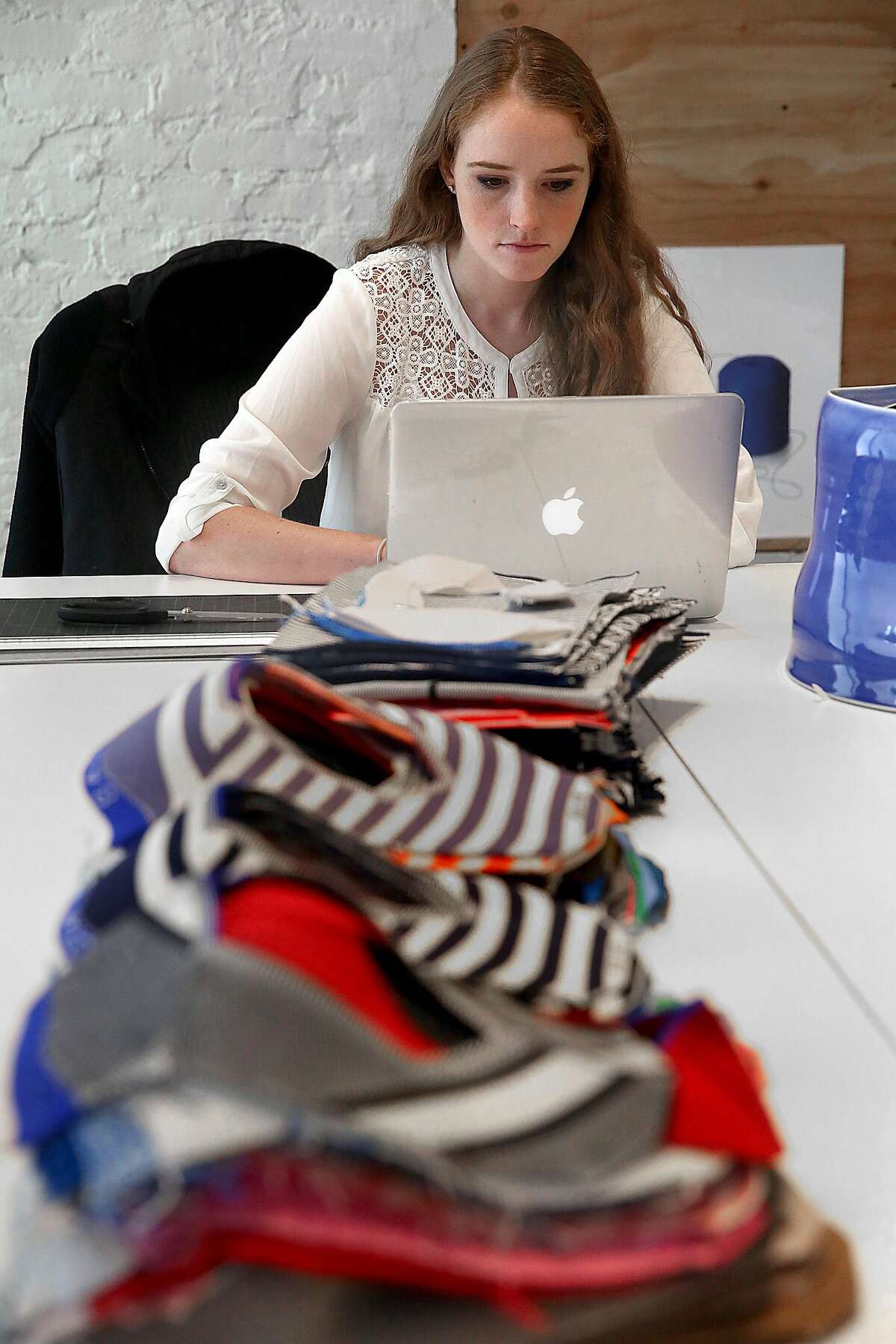 Graphic designer Ashlee Rice works at Rothy's, a female shoe brand, on Thursday, July 28, 2016, in San Francisco, Calif.