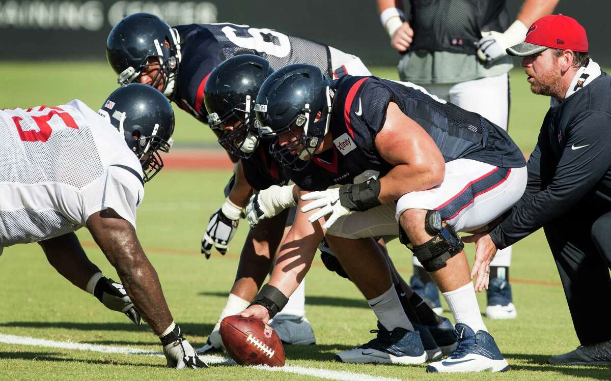 Texans rookie center Nick Martin (right) has earned strong praise from coach Bill O'Brien so far in training camp.