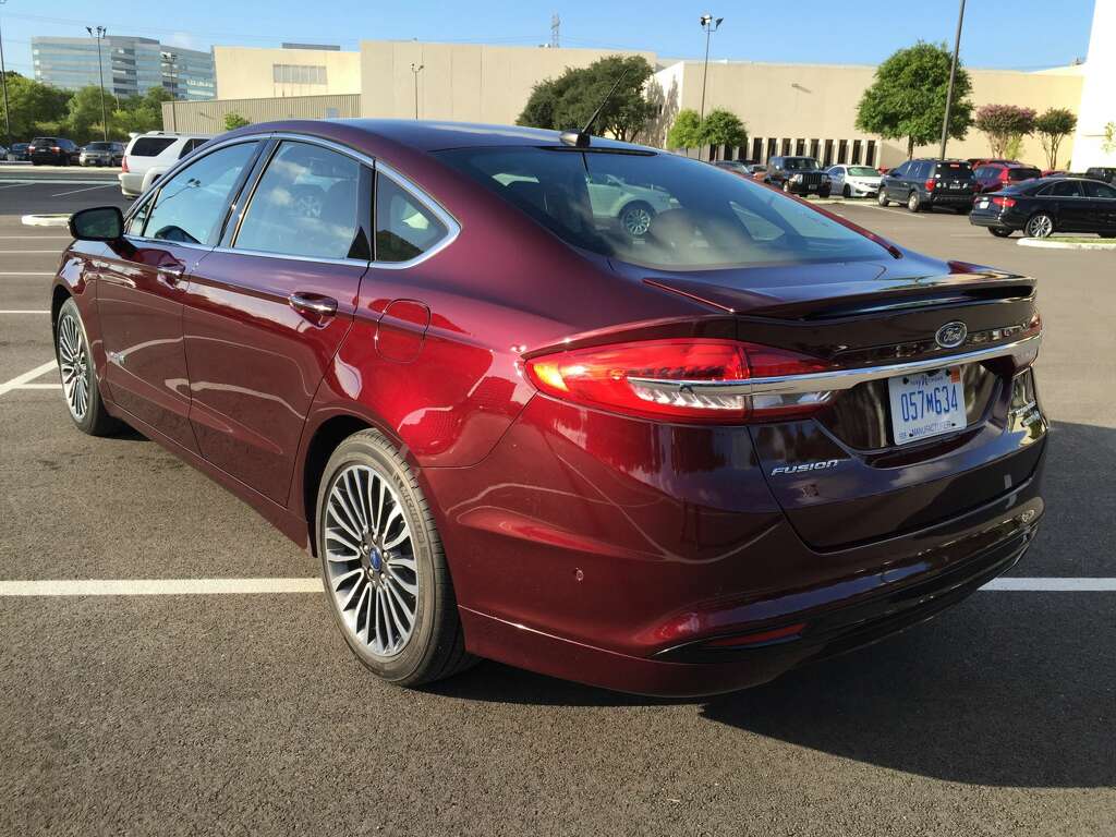 Review 2017 Ford Fusion Hybrid Anium Houston Chronicle The 2017 Ford Fusion Hybrid Anium Parked In Front Houston Chronicle Building Photo