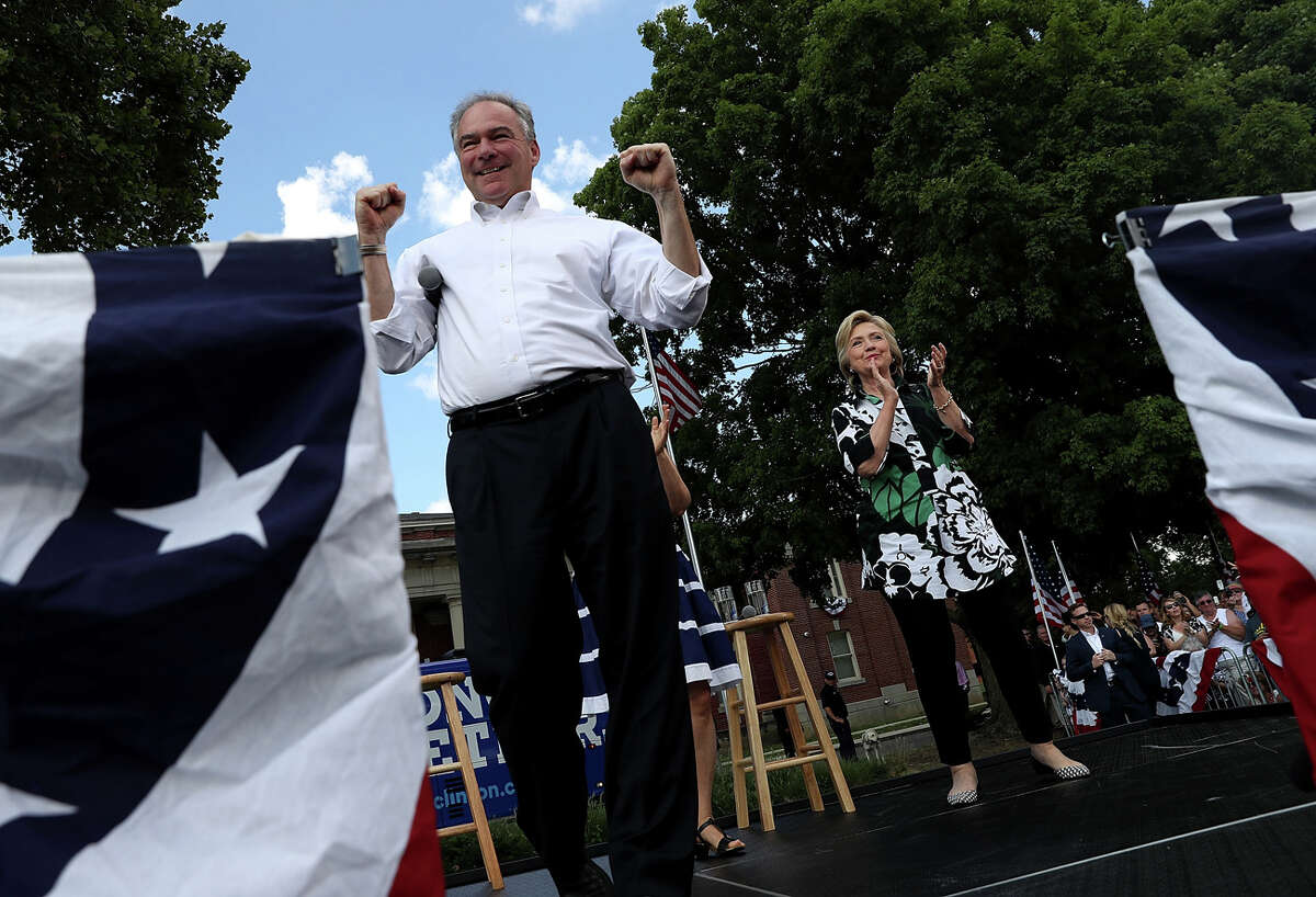 COLUMBUS, OH - JULY 31: Democratic presidential nominee former Secretary of State Hillary Clinton democratic vice presidential nominee U.S. Sen Tim Kaine (D-VA) greet supporters during a campaign rally at Fort Hayes Vocational School on July 31, 2016 in Columbus, Ohio. Hillary Clinton and Tim Kaine are wrapping up their three-day bus tour through Pennsylvania and Ohio. (Photo by Justin Sullivan/Getty Images)