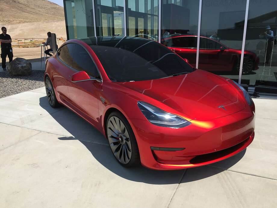 Watch Top Entries For Tesla S Car Commercial Contest Announced Sfgate A Prototype Of The 35 000 Tesla Motors Model 3 Outside Company S Gigafactory In Nevada