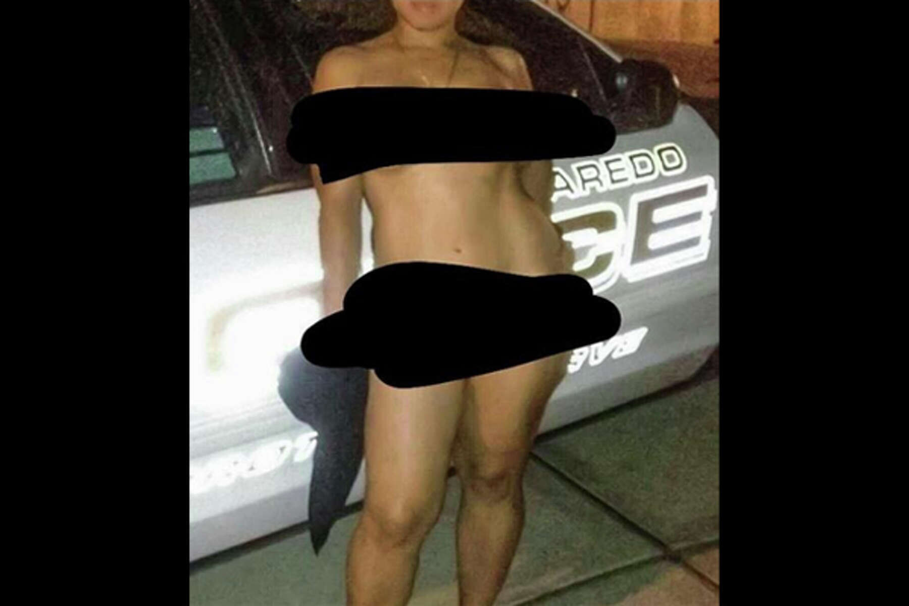 nude woman posing on Laredo fire trucks