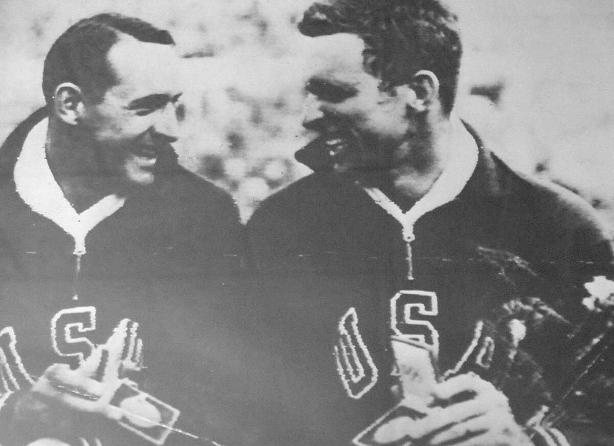 This enlarged photograph of Walter Davis, right, and a teammate, after they both won medals, was hanging in the home office. Walter F. 