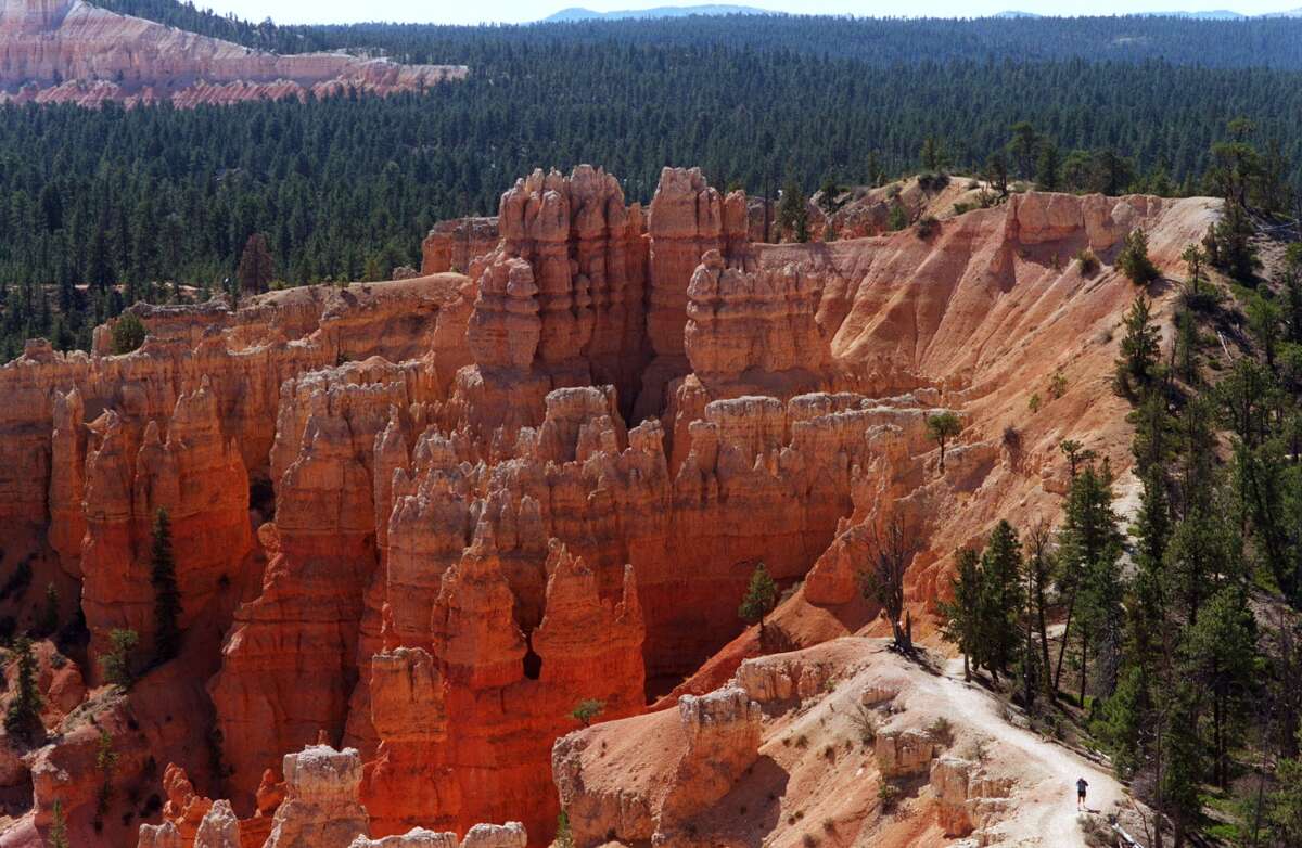 A visitor makes his way down a hiking trail in Bryce Canyon National Park.