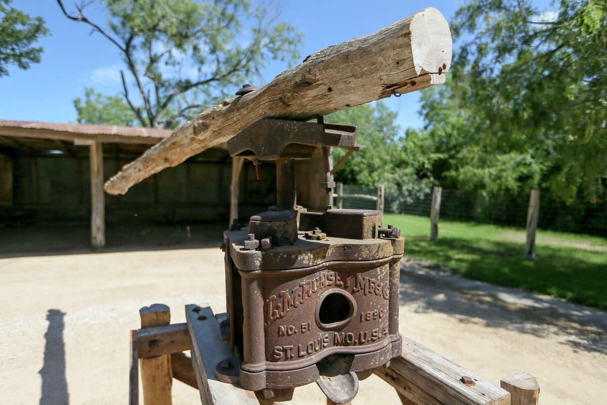 A cane press made in 1890 sits in front of the milk cow barn at the Harrison House in Selma. The house, originally built in 1852 by John Harrison and his wife, is on the National Register of Historic Places and is the site of an open house Aug. 10.