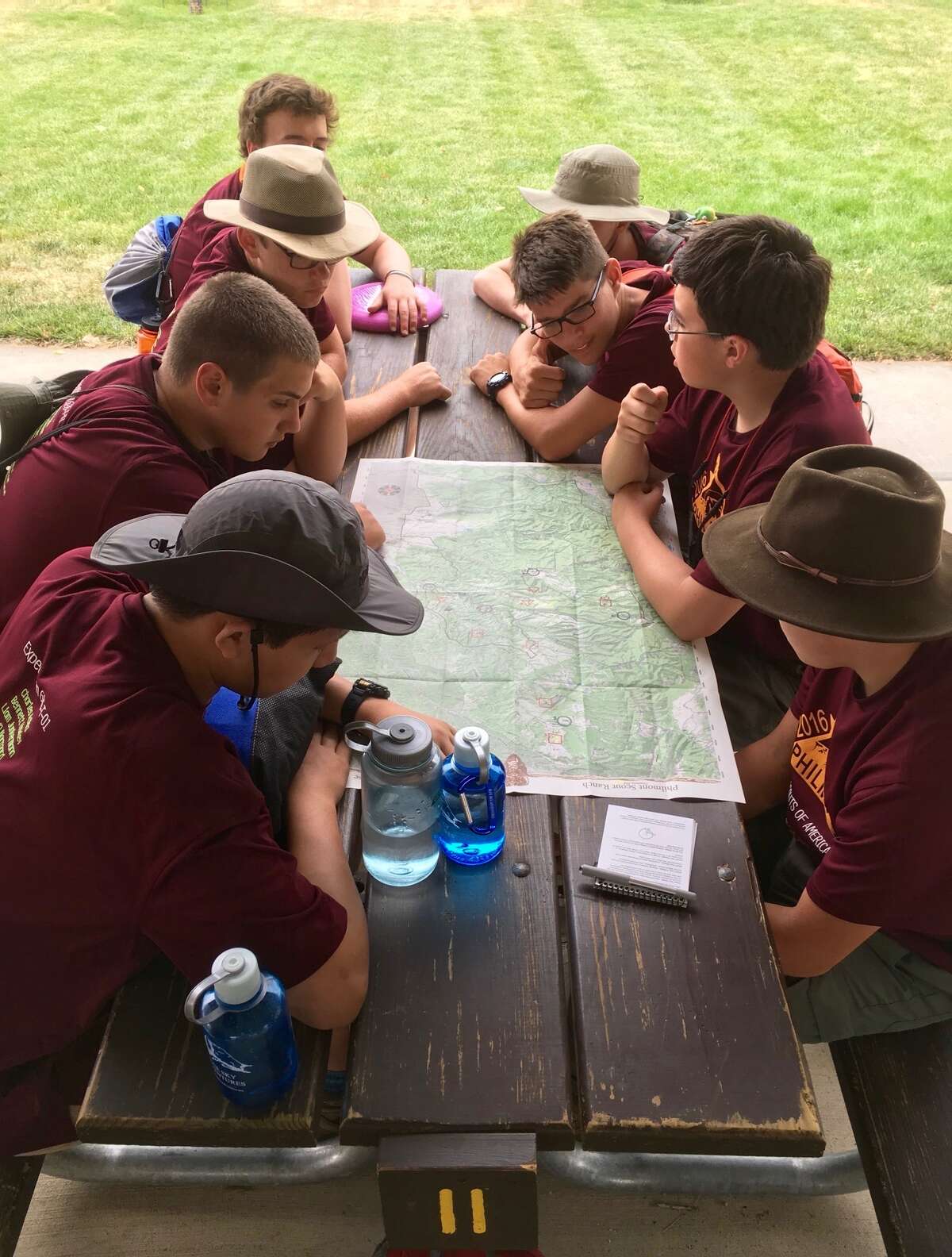 Boy Scouts from Greenwich work out their itinerary in the mountains of New Mexico.