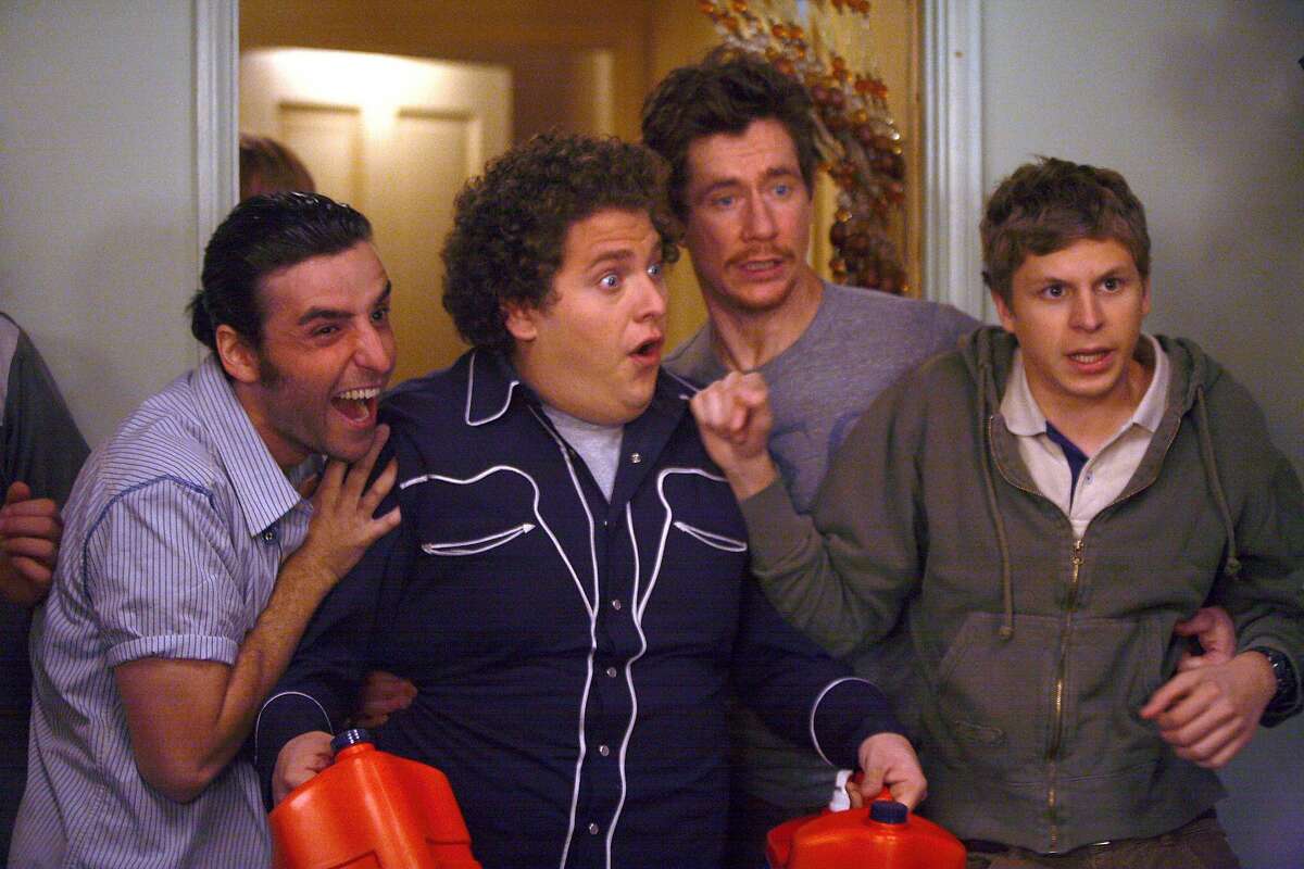 SB-210 : Seth (Jonah Hill, center left) and Evan (Michael Cera, right) can have the night they�ll remember for the rest of their lives in Superbad, the new film from producers Judd Apatow and Shauna Robertson (The 40-Year-Old Virgin), screenwriters Seth Rogen & Evan Goldberg, and director Greg Mottola. Photo Credit : Melissa Moseley.