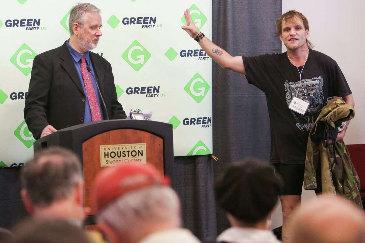 Texas Green Party candidate for State Representative, District 46 Adam Greeley, right, yells at Green Party Media Director Scott McLarty, left, after Greeley wasn't given time to speak at a press conference at the Green Party Convention at the University of Houston Friday, August 5, 2016 in Houston.