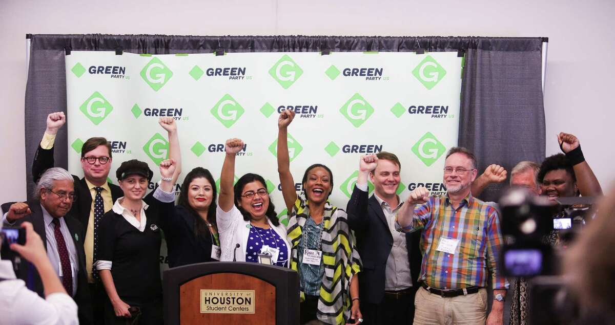 Green Party candidates from Texas and across the United States display their unity after Friday's news conference at their convention.