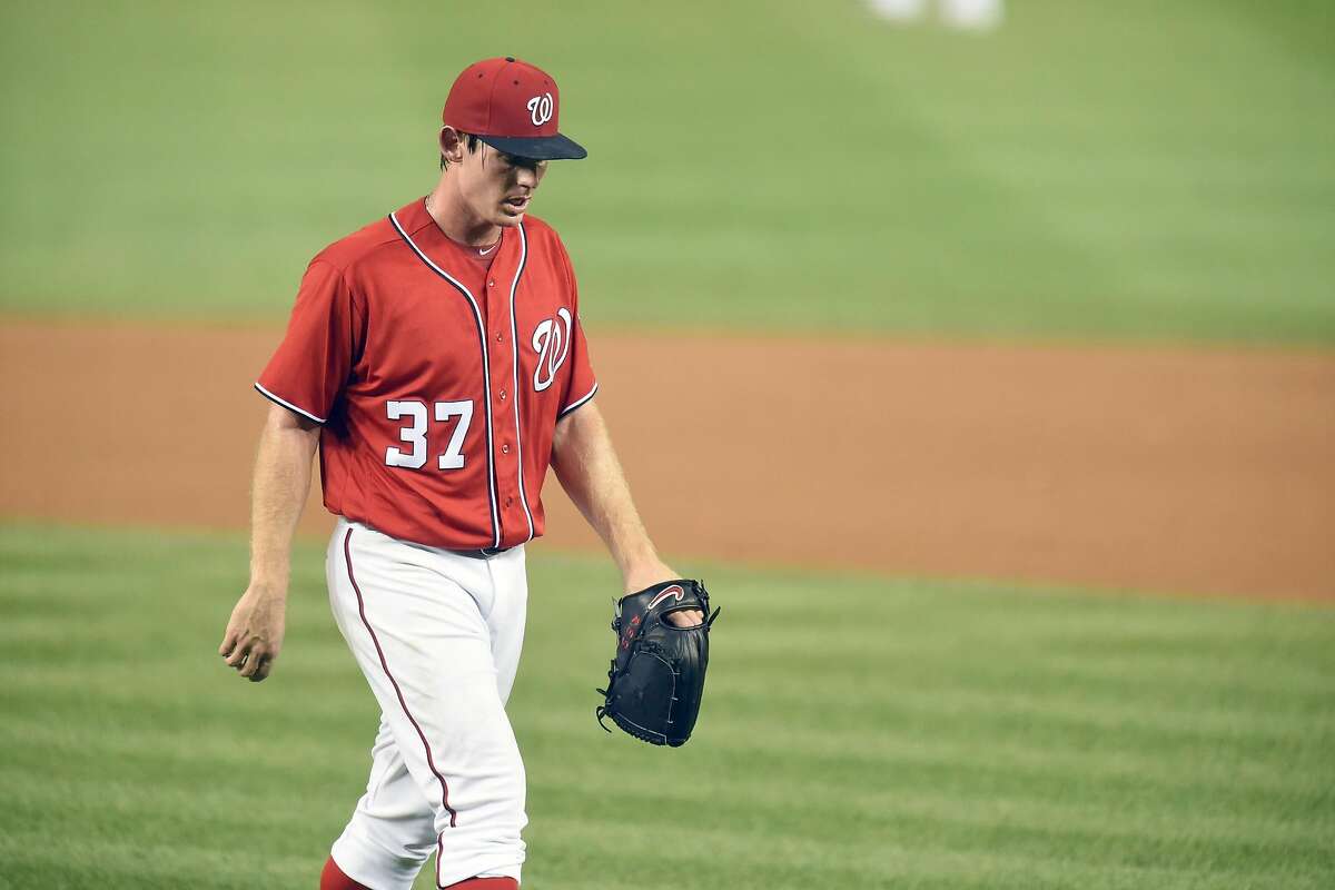 WASHINGTON, DC - AUGUST 06: Stephen Strasburg #37 of the Washington Nationals walks to the dug out after getting taken out in the fifth inningduring a baseball game against the San Francisco Giants at Nationals Park at on August 6, 2016 in Washington, DC. (Photo by Mitchell Layton/Getty Images)