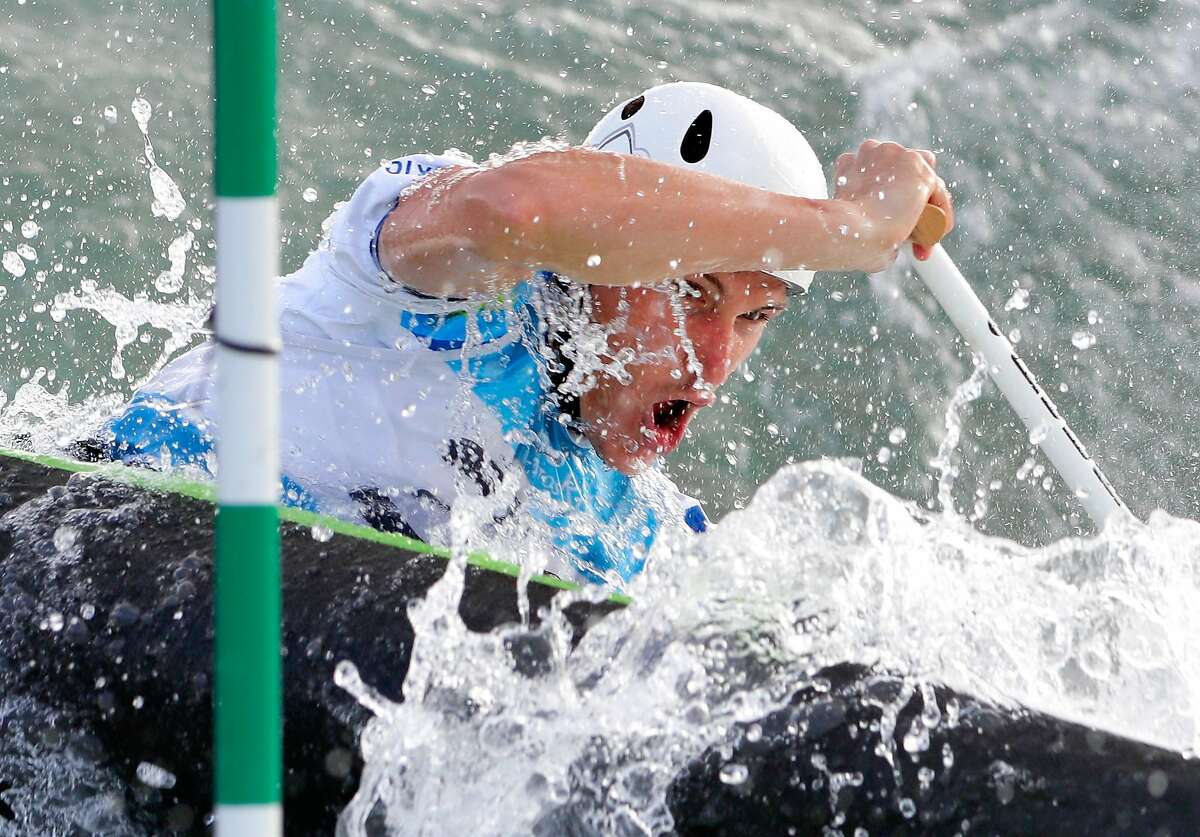 A competitor practices during training for the whitewater kayak event prior to the 2016 Summer Olympics on August 2, 2016 in Rio de Janeiro, Brazil. (Photo by Jamie Squire/Getty Images)