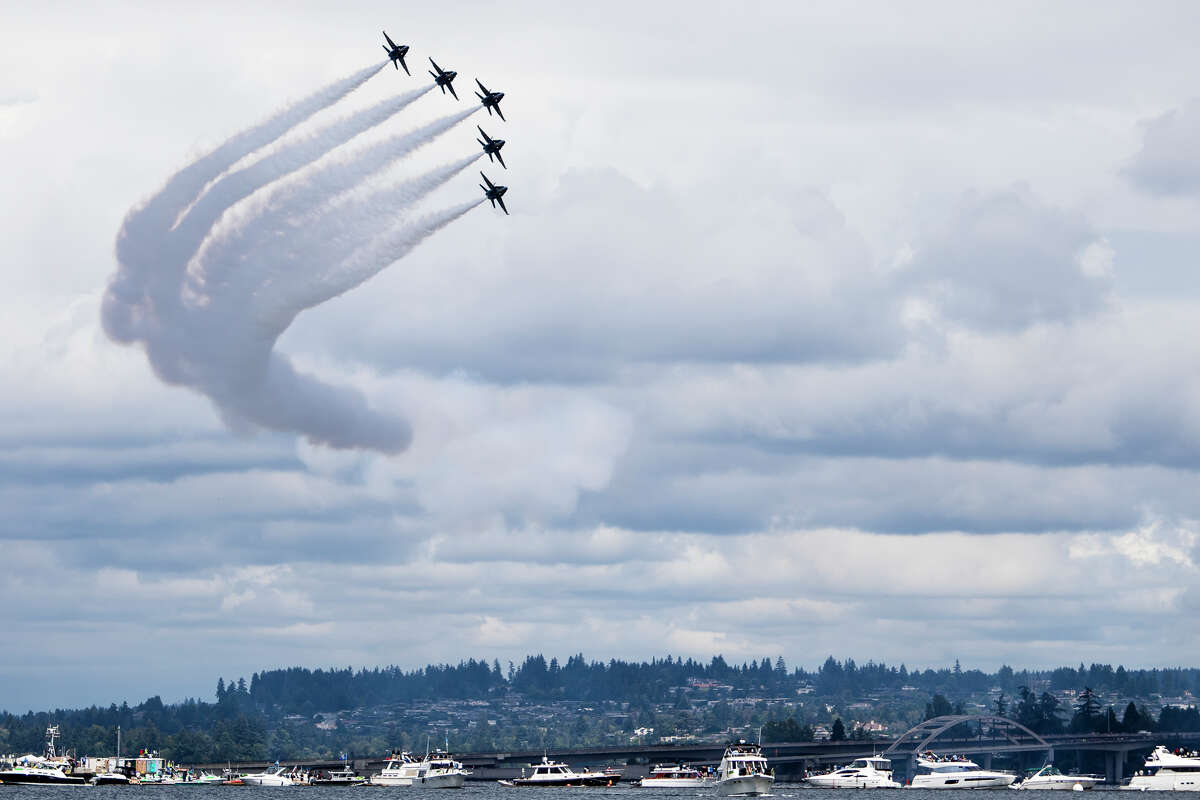The U.S. Navy Blue Angels pass over Lake Washington during their final performance of Seafair weekend on Sunday, Aug. 7, 2016. (Lacey Young, seattlepi.com)