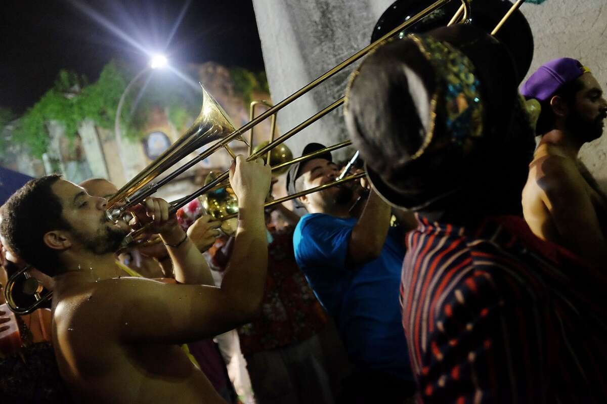 Revelers celebrate during pre-Carnival festivities on February 21, 2014 in Rio de Janeiro, Brazil.