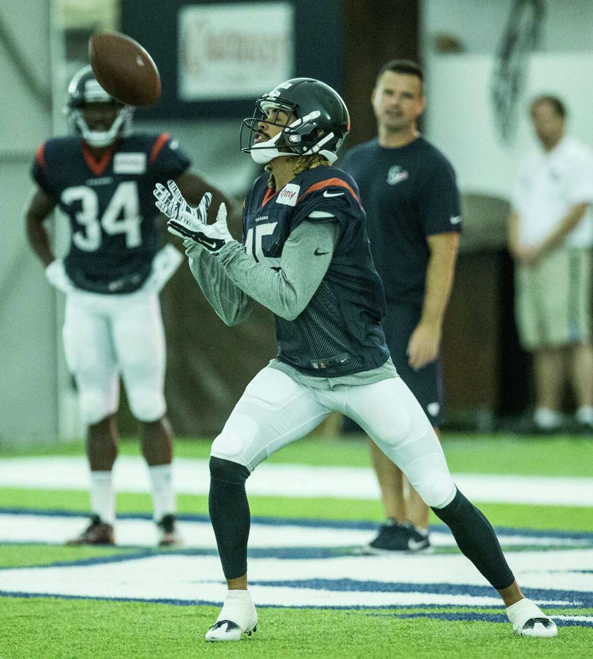 Houston Texans wide receiver Will Fuller receives a kick during Texans training camp at Houston Methodist Training Center on Monday, Aug. 8, 2016, in Houston.