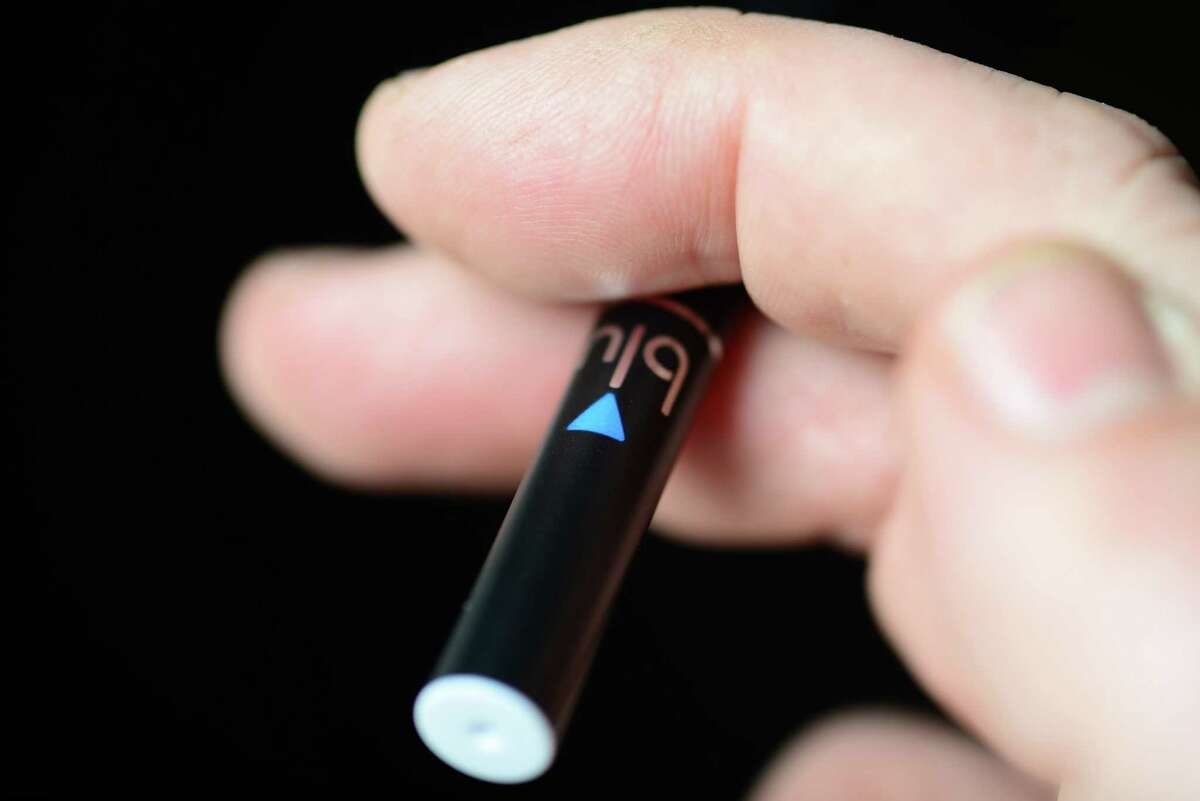 Young people who use e-cigarettes for a prolonged period often cite low cost and the desire to quit smoking as reasons for vaping, according to a study by Yale University researchers published online Aug. 8, 2016 in the journal Pediatrics. (Will Waldron/Times Union)