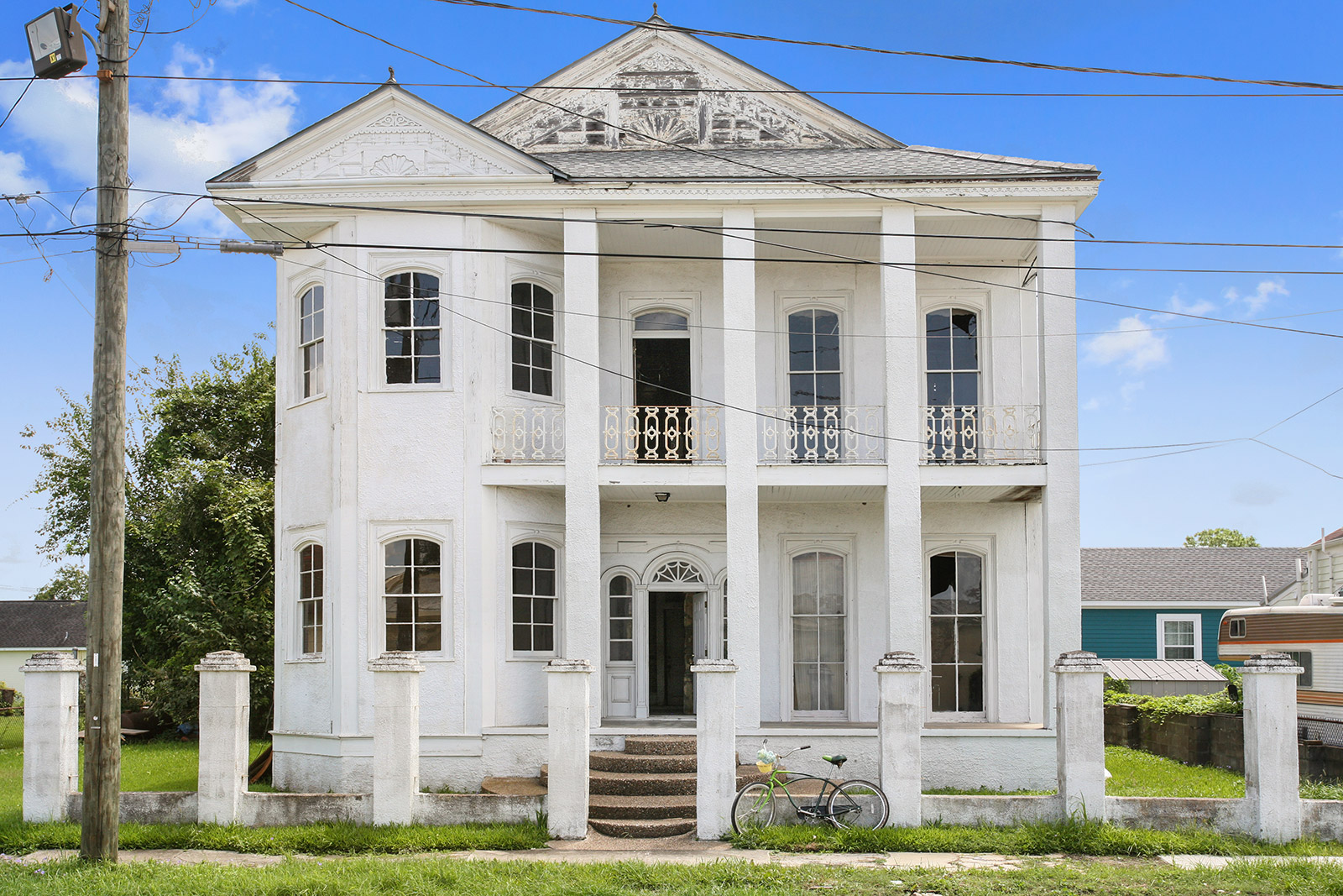 Before and after Iconic New Orleans house
