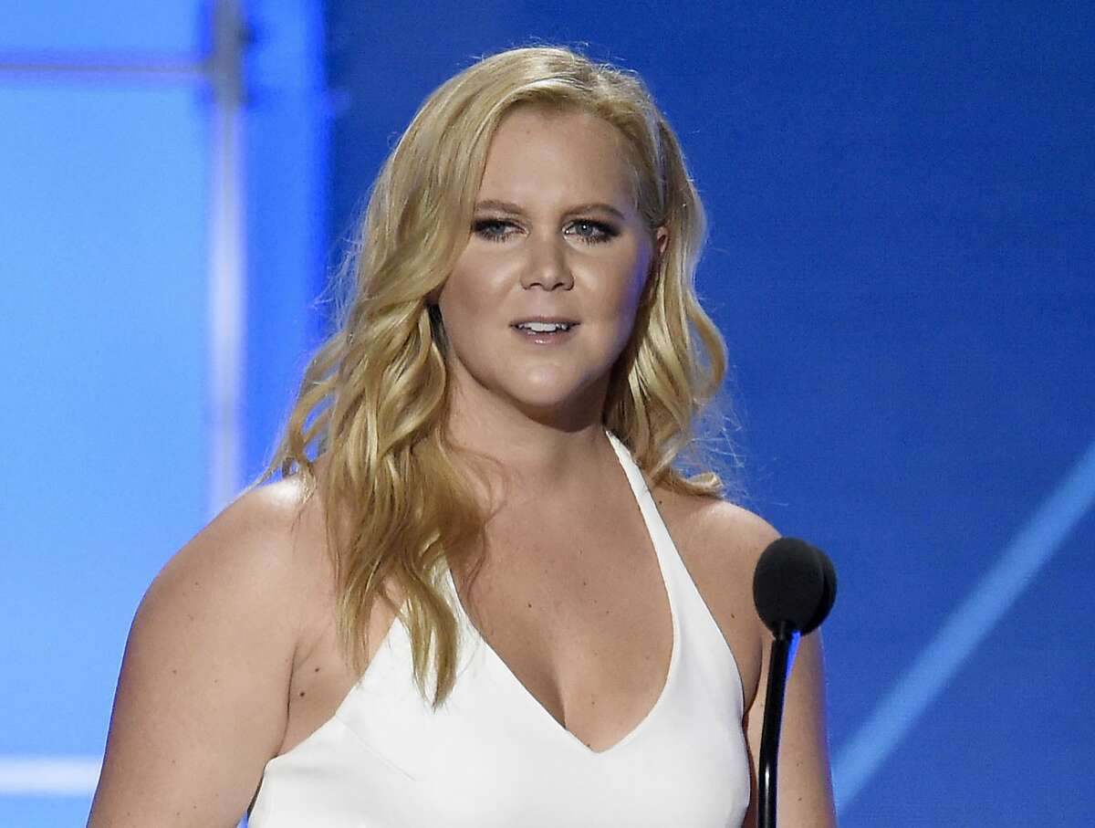 FILE - In this Jan. 17, 2016 file photo, Amy Schumer accepts the Critics' Choice MVP award at the 21st annual Critics' Choice Awards in Santa Monica, Calif. Schumer will voice characters on “The Simpsons,” “Bob’s Burgers” and “Family Guy” on the episodes airing Sept. 25, Fox confirmed Monday at a bi-annual press event for TV critics. (Photo by Chris Pizzello/Invision/AP, File)