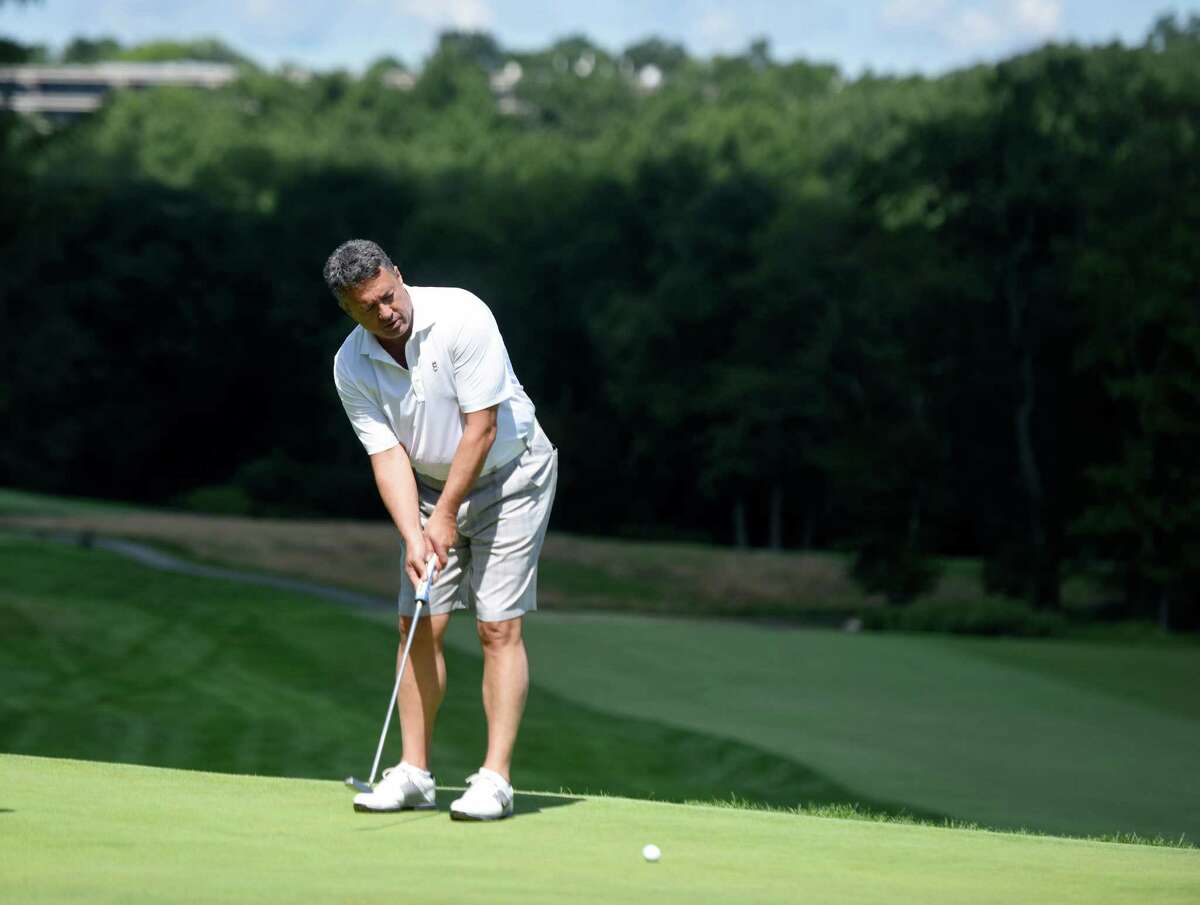 Former New York Mets pitcher Ron Darling putts during the 26th annual Tim Teufel Celebrity Golf Tournament at Tamarack Country Club golf course in Greenwich, Conn. Monday, Aug. 8, 2016. The golf outing, presented by Sweet'N Low, featured more than a dozen former and current sports celebrities competing on the course to raise money for the Fairfield County Sports Commission.