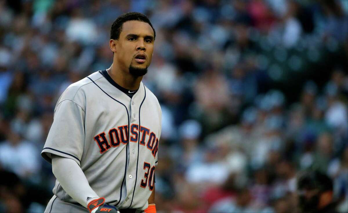 Houston Astros' Carlos Gomez walks to the dugout during a baseball game against the Seattle Mariners, Friday, July 15, 2016, in Seattle. (AP Photo/Ted S. Warren)