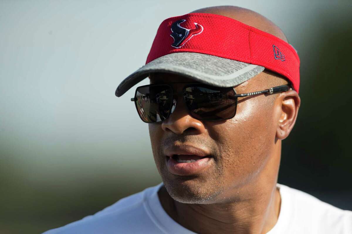 Houston Texans general manager Rick Smith watches practice during Texans training camp at Houston Methodist Training Center on Tuesday, Aug. 9, 2016, in Houston.