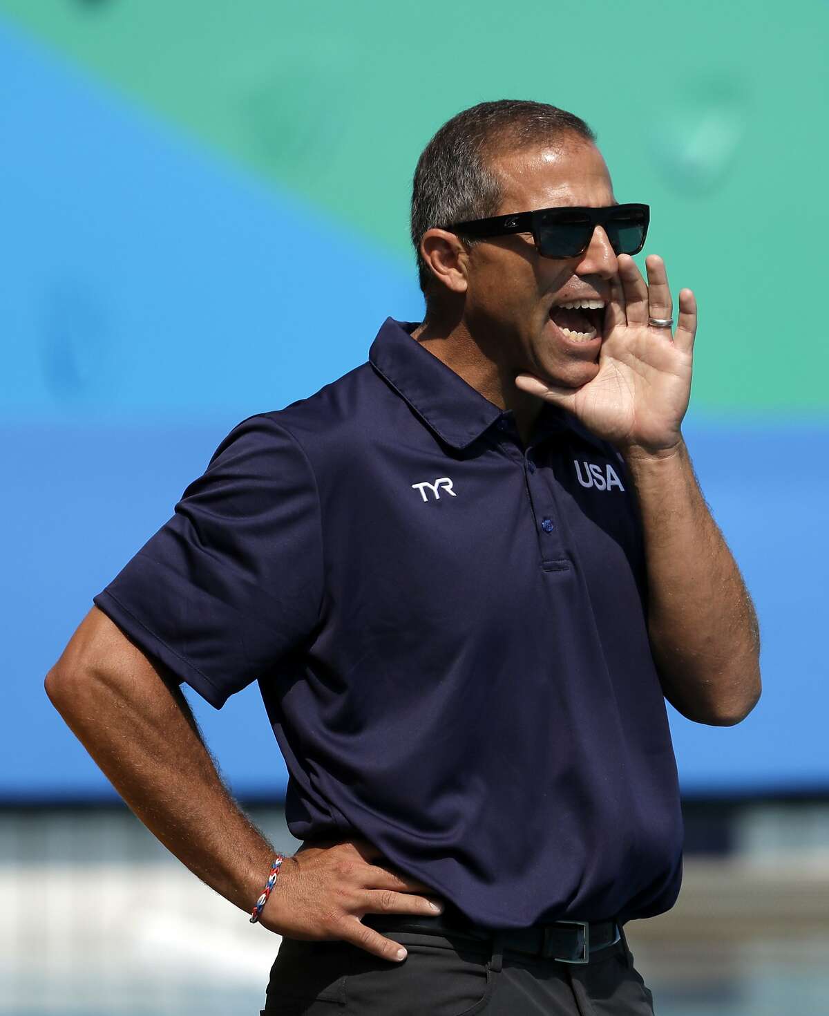 United States' coach Adam Krikorian reacts as he watches his team play against Spain during their women's water polo preliminary round match at the 2016 Summer Olympics in Rio de Janeiro, Brazil, Tuesday, Aug. 9, 2016. 