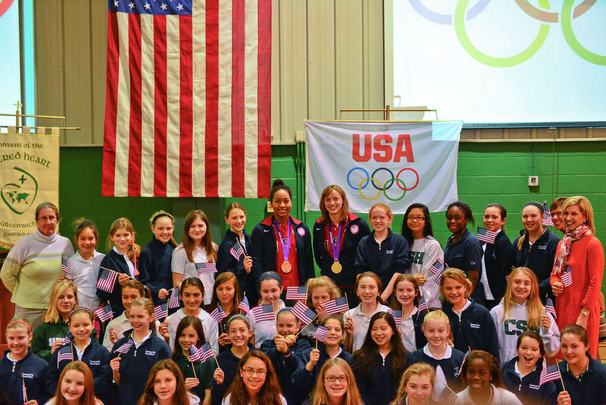 Lia Neal (center left) and Katie Ledecky (center right) visited Sacred Heart Greenwich students in 2013.