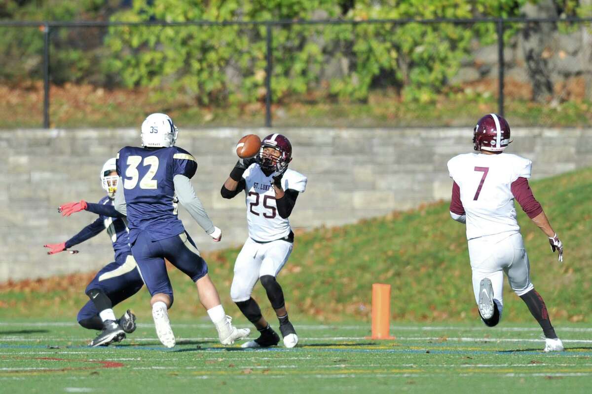 Omar Fortt, of St. Luke's, catches a pass that he would run into the endzone during a game against King School at Kings School on Saturday, Nov. 4, 2015.