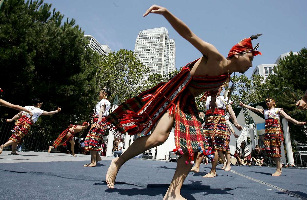 filipino111.jpg Members of the Barangay-San Francisco dance group entertained festival goers early in the afternoon. The 13th annual Pistahan parade and festival were held Sunday to to celebrate the Northern California Filipino community. It was held at the Yerba Buena Gardens in San Francisco. {Brant Ward/The Chronicle} 8/13/06