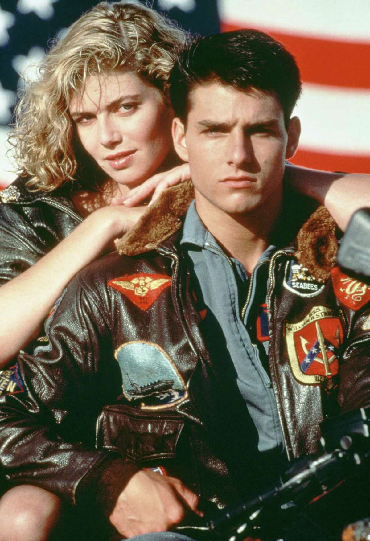 Tom Cruise and Kelly McGillis star in the 1986 military film "Top Gun." American actors Tom Cruise, as Lieutenant Pete 'Maverick' Mitchell, and Kelly McGillis, as Charlotte 'Charlie' Blackwood, in a promotional portrait for 'Top Gun', directed by Tony Scott, 1986. (Photo by Paramount Pictures/Archive Photos/Getty Images)