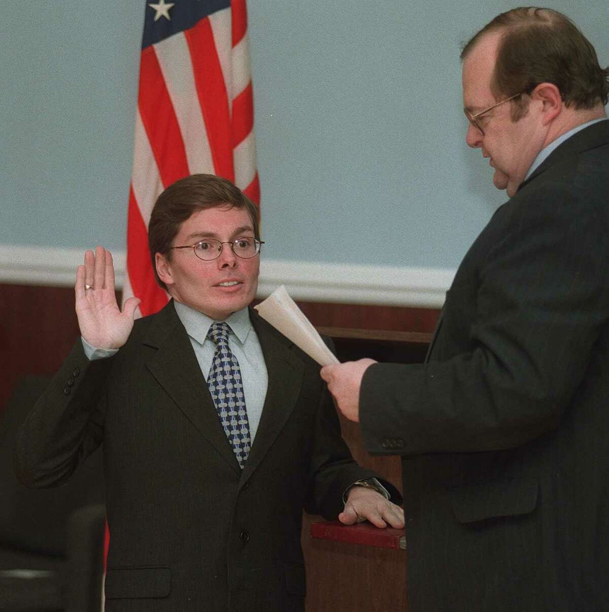 Martin Landgrebe, Probate Judge, of New Milford, Conn., is sworn in by Mayor Arthur Peitler, at Town Hall, Tuesday Jan. 5 1999.