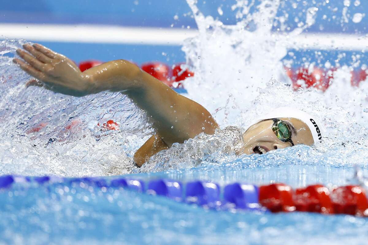 Refugee Olympic Team's Yusra Mardini competes in a Women's 100m Freestyle heat during the swimming event at the Rio 2016 Olympic Games at the Olympic Aquatics Stadium in Rio de Janeiro on August 10, 2016. / AFP PHOTO / Odd AndersenODD ANDERSEN/AFP/Getty Images
